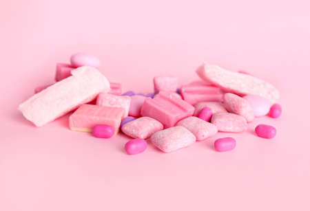 Different chewing gums on color backgroundの写真素材