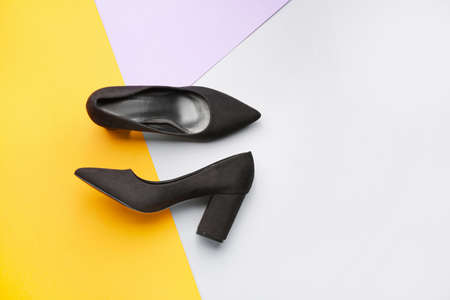 Stylish female shoes on color backgroundの写真素材