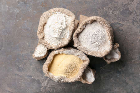 Bags with different flour on grunge backgroundの写真素材