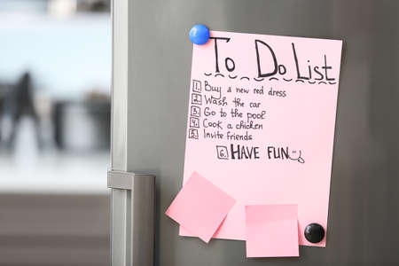 To-do list on fridge in kitchenの写真素材