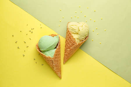 Sweet tasty ice-cream on color background