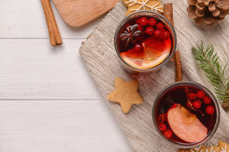 Glasses of tasty mulled wine on tableの写真素材
