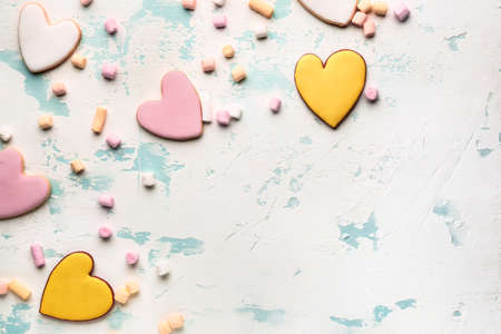 Heart shaped cookies for Valentine's day with marshmallows on white backgroundの写真素材