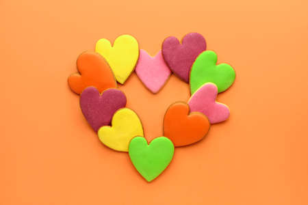 Heart shaped cookies for Valentine's day on color background