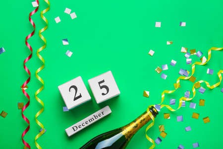 Calendar with date of Christmas on color backgroundの写真素材