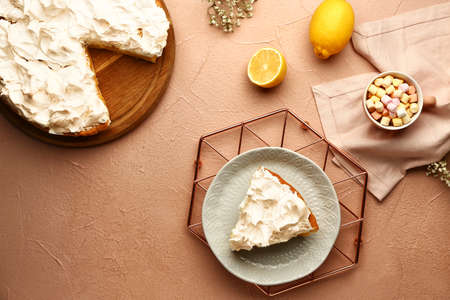 Tasty lemon pie with cacao on table