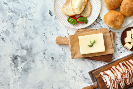 Composition with fresh butter and products on white backgroundの写真素材