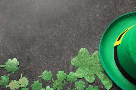 Hat of leprechaun with clover on dark background. St. Patrick's day celebrationの写真素材
