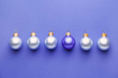 Beautiful Christmas balls on color background