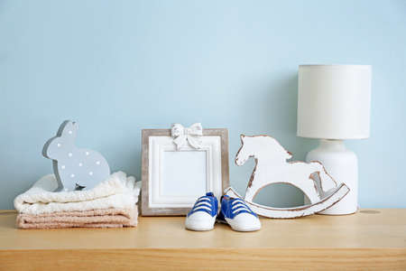 Baby accessories on table in room
