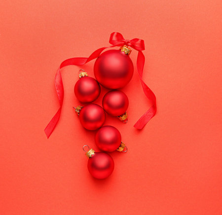 Beautiful Christmas balls on color backgroundの写真素材