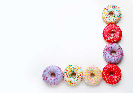 Sweet tasty donuts on white backgroundの写真素材
