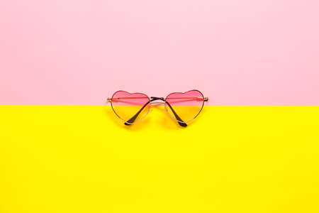 Stylish sunglasses on color backgroundの写真素材