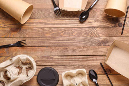 Different garbage on wooden background. Recycling conceptの写真素材