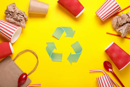 Different garbage on color background. Recycling concept