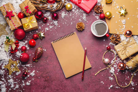 Christmas composition with empty notebook on color backgroundの写真素材