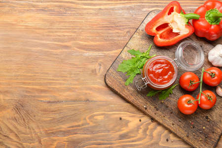 Composition with tasty barbecue sauce on tableの写真素材