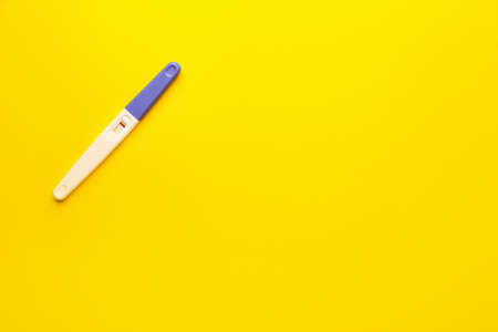 Pregnancy test on color backgroundの写真素材