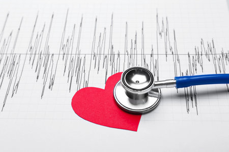 Stethoscope with heart and cardiogram, closeupの写真素材
