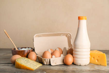 Different dairy products on wooden tableの写真素材