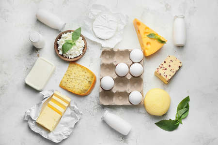 Different dairy products on light backgroundの写真素材