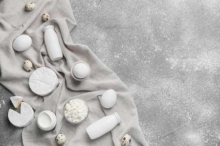 Different dairy products on gray backgroundの写真素材