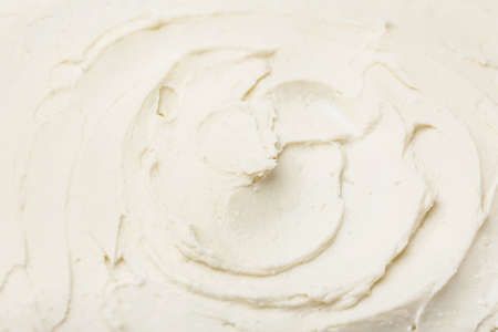Tasty cream cheese as backgroundの写真素材