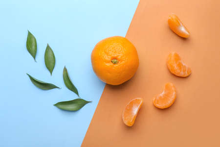 Sweet tangerine on color background