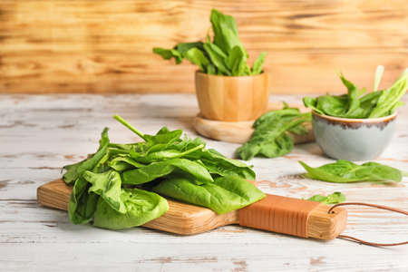 Fresh green spinach on table