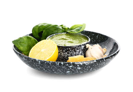 Pesto sauce with ingredients on white backgroundの写真素材