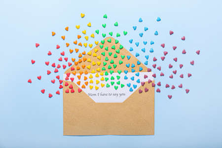 Envelope with letter and hearts on color background. LGBT conceptの写真素材