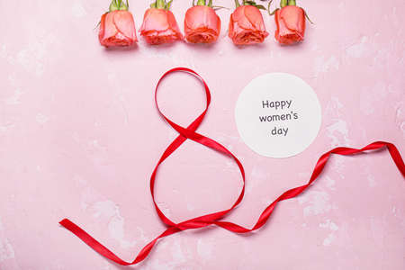 Composition for International Women's Day on color backgroundの写真素材