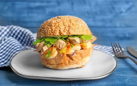 Tasty doner kebab in bun on plateの写真素材