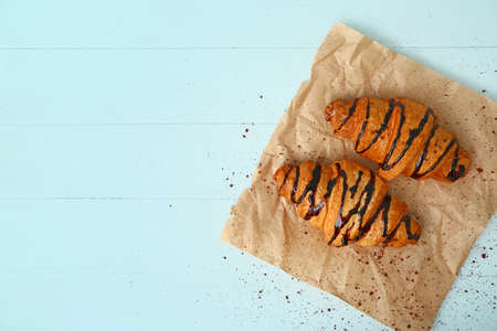 Tasty sweet croissants on tableの写真素材