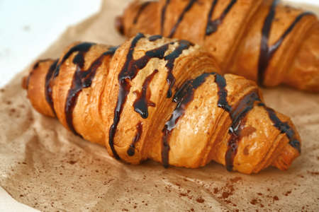 Tasty sweet croissants on table, closeupの写真素材