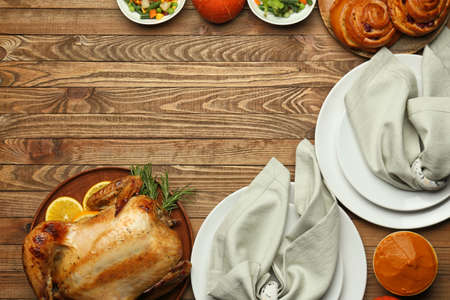 Tasty baked turkey for Thanksgiving day on served tableの写真素材