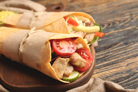 Tasty doner kebab on table