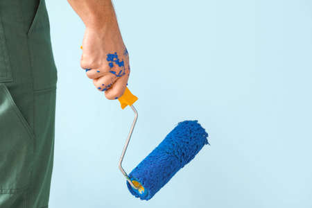 Male painter near color wall, closeupの写真素材