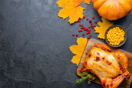 Composition with baked turkey for Thanksgiving day on tableの写真素材