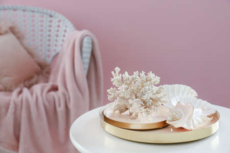 Beautiful marine decor on table in roomの写真素材