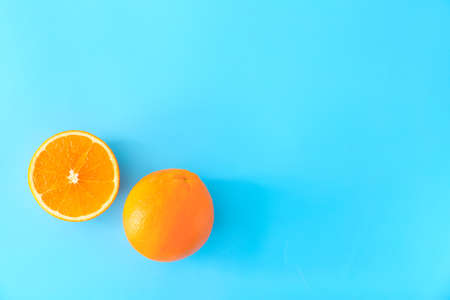 Sweet oranges on color backgroundの写真素材