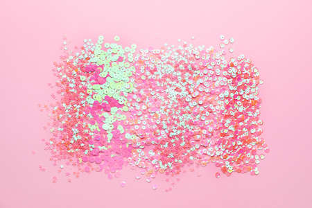 Many glitters on pink backgroundの写真素材