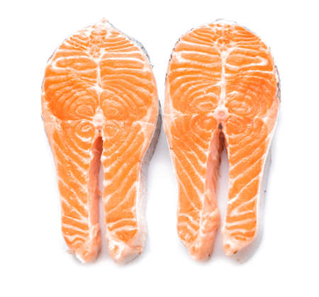 Raw salmon steaks on white backgroundの写真素材