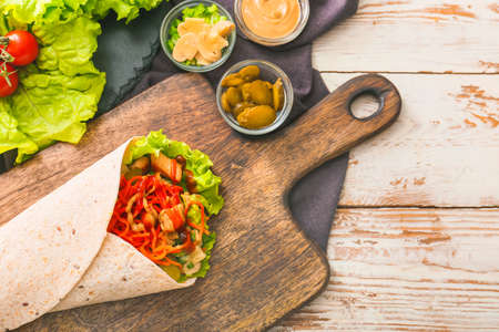 Tasty doner kebab on tableの写真素材