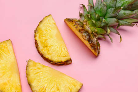 Fresh cut pineapple on color background