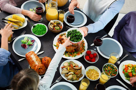 Family celebrating Thanksgiving Day at home
