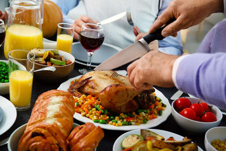 Family celebrating Thanksgiving Day at home