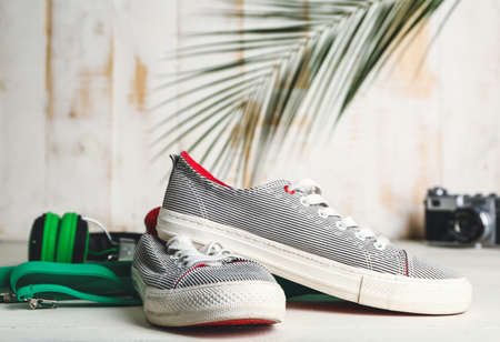 Male shoes and accessories on table