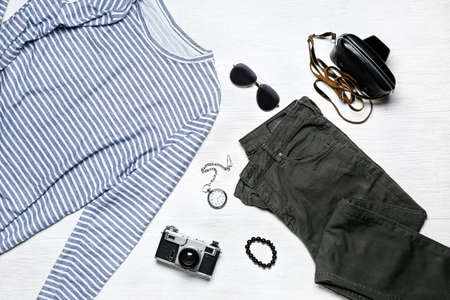 Set of male clothes and accessories on wooden backgroundの写真素材