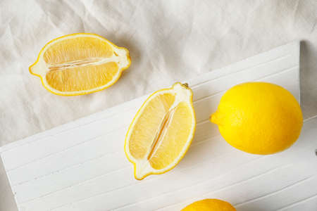 Fresh ripe lemons on table